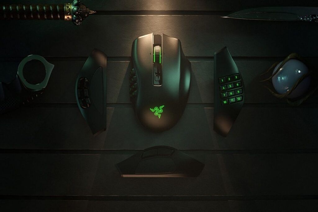 Black-colored Razer gaming mouse with green lights