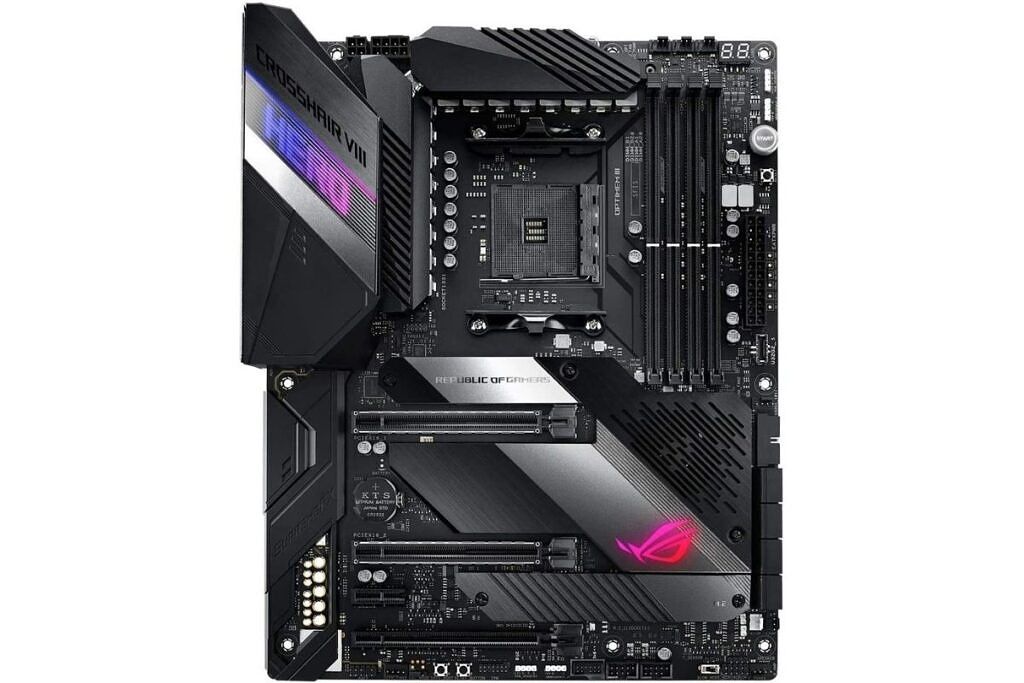 A black colored ASUS motherboard with some RGB lights on a white background