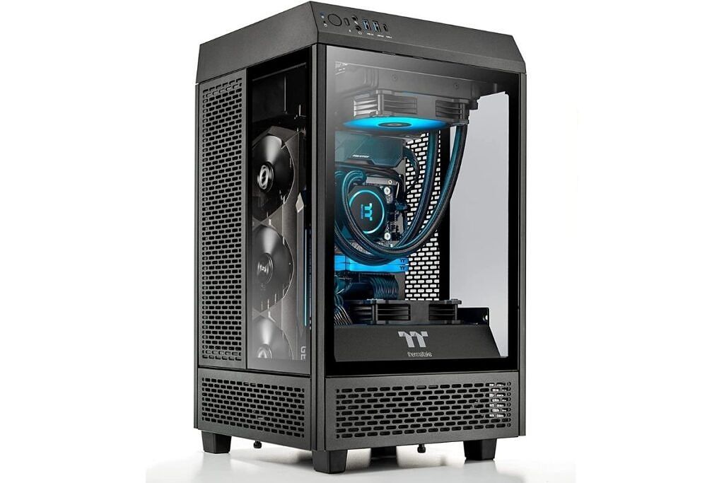 A black colore gaming pc tower with see-through glass panels