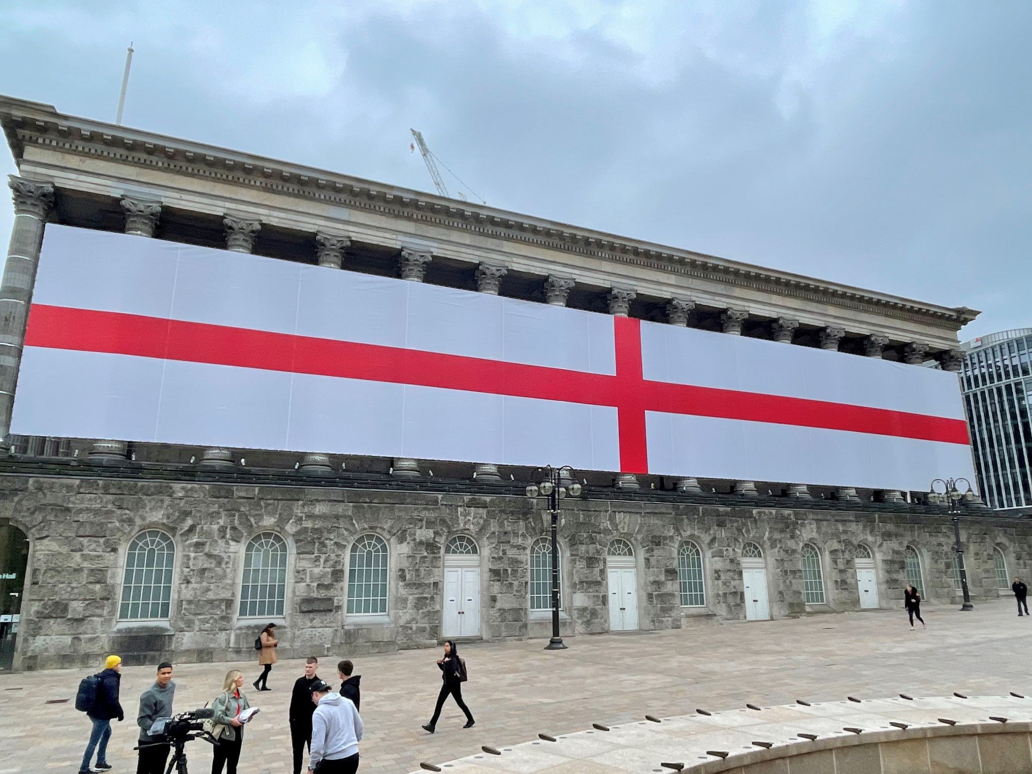 A giant England flag takes over Birmingham Town Hall to mark St George's Day and celebrate the city's achievement of hosting a major multi-sport event ©ITG